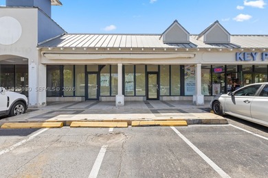 Located in a well-established, high-traffic strip center in the - photo 2