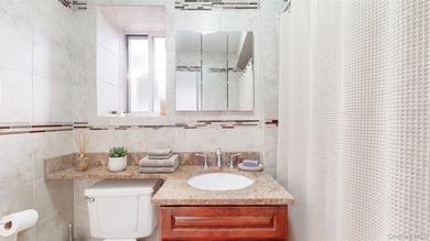 DEEDED PARKING SPOT INCLUDED with this beautifully maintained - photo 9