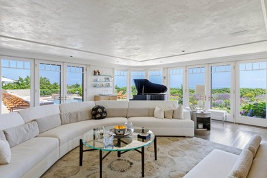 With approximately 200 feet of direct ocean frontage on one of - photo 15