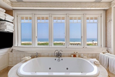 With approximately 200 feet of direct ocean frontage on one of - photo 20