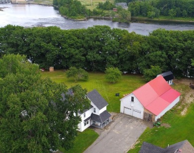 This graceful 1900s cozy farmhouse showcases historical features - Lake Home For Sale in Howland, Maine