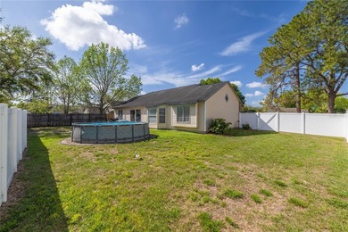 Welcome to this inviting 3-bedroom, 2-bathroom pool home located - photo 22