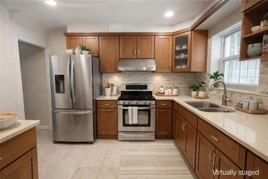 Exceptional opportunity in the heart of Bensonhurst! This solid - photo 5
