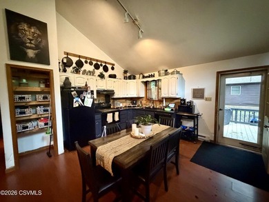 Welcome to this charming and cozy A-frame nestled in the Beech - photo 3