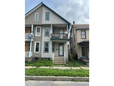 Opportunity awaits with this 3-bedroom, 2 bath half double - photo 1