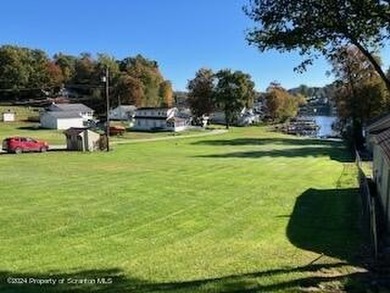 BUILD HERE! HALF ACRE OF LAND WITH 35 FEET OF LAKE FRONTAGE - photo 3