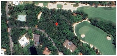 Wooded lot is very private with 27,470 sq ft. lot size. Situated - photo 1