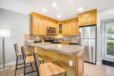 This charming ground-level 1-bedroom, 1-bathroom condo offers - photo 2