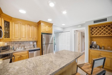 This charming ground-level 1-bedroom, 1-bathroom condo offers - photo 3