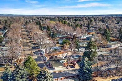 Comfortable corner-lot living in northwest Fort Collins! This