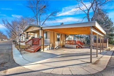 Comfortable corner-lot living in northwest Fort Collins! This