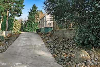 Well maintained and inviting, this coastal-inspired manufactured