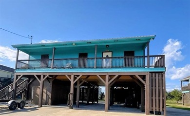 Waterfront Retreat with Guest Cottage & Direct Calcasieu Lake - photo 1