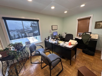 Highly visible corner property located at the intersection of