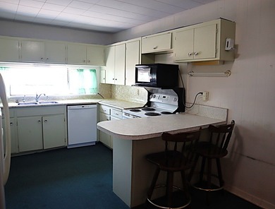 Brick home with 3 bedrooms, 2 bathrooms, 2 living rooms