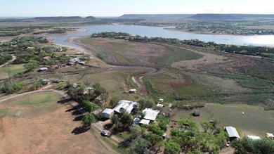 Experience a rare blend of lakeside serenity and golf course - photo 9