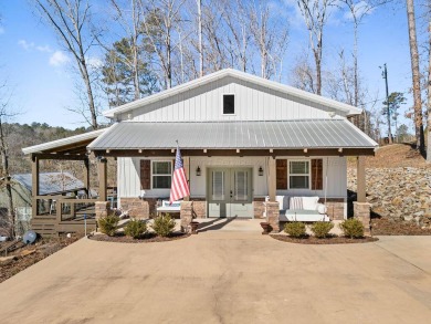 Discover the perfect lake retreat on Smith Lake. This nearly new - Lake Home For Sale in Logan, Alabama